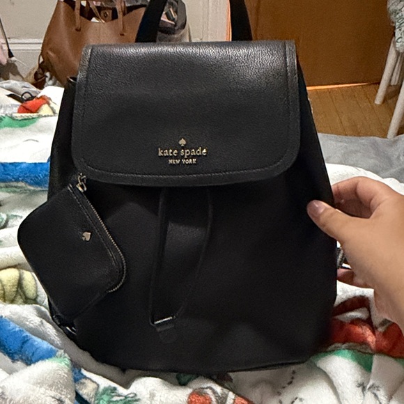 kate spade Handbags - Rosie medium flap backpack in black